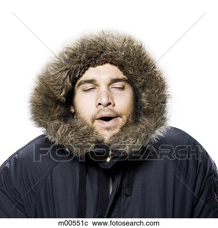 man wearing a winter coat with a fur trimmed hood View Large Photo Image Stock Image - man wearing a winter coat with a fur trimmed hood. Fotosearch