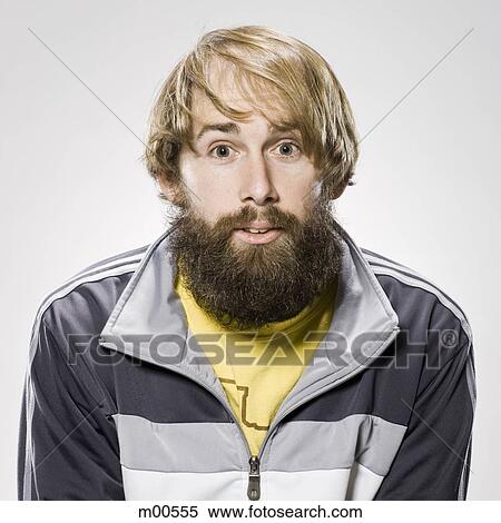 Stock Photography - man with a beard wearing a track jacket. Fotosearch
