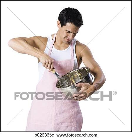 Stock Image - man with a mixing bowl. Fotosearch