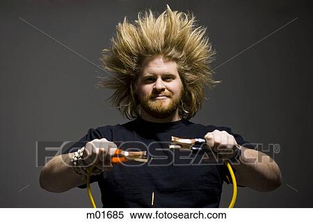 man with crazy hair holding jumper cables View Large Photo Image Stock Photography - man with crazy hair holding jumper cables. Fotosearch