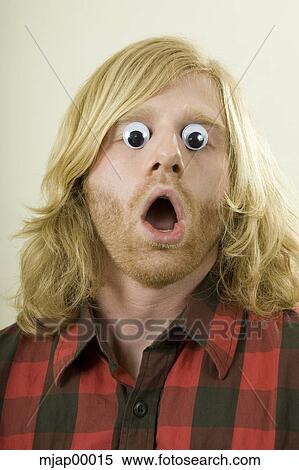 man with toy eyes over his eyes View Large Photo Image Stock Photography - man with toy eyes over his eyes. Fotosearch