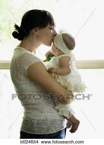 Picture - mother and baby girl. Fotosearch