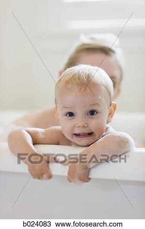 mother and baby taking a bubble bath View Large Photo Image Stock Image - mother and baby taking a bubble bath. Fotosearch