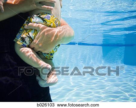 mother and child in a swimming pool View Large Photo Image Stock Image - mother and child in a swimming pool. Fotosearch