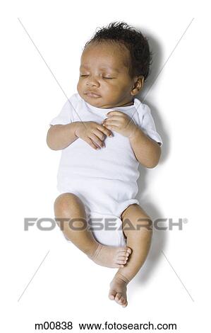Stock Photo - newborn baby in white. Fotosearch