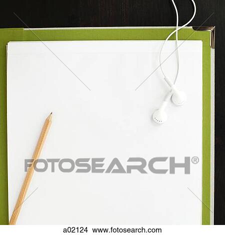 Pencil and earphones on blank paper with file View Large Photo Image Picture - Pencil and earphones on blank paper with file. Fotosearch