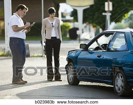 people looking at a car after an accident View Large Photo Image Stock Image - people looking at a car after an accident. Fotosearch