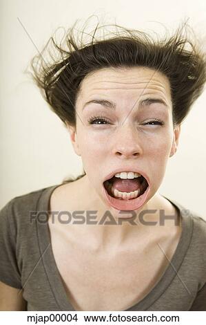 person getting wind blown in the face View Large Photo Image Picture - person getting wind blown in the face. Fotosearch