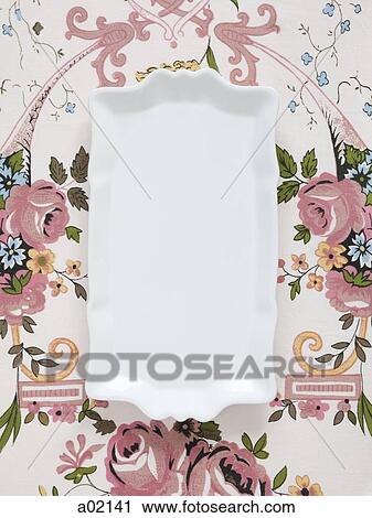 Plate on floral tablecloth View Large Photo Image Stock Image - Plate on floral tablecloth. Fotosearch