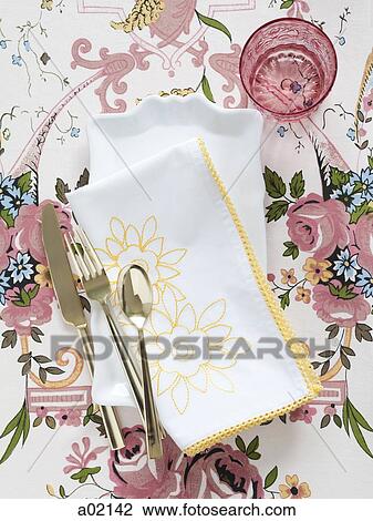 Plate with napkin and cutlery on floral tablecloth View Large Photo Image Stock Image - Plate with napkin and cutlery on floral tablecloth. Fotosearch