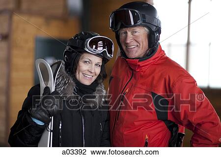 Portrait of mature couple going skiing View Large Photo Image Stock Image - Portrait of mature couple going skiing. Fotosearch