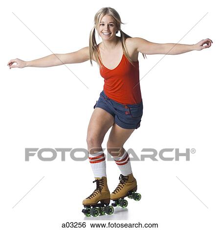 Portrait of young woman roller skating View Large Photo Image Stock Photograph - Portrait of young woman roller skating. Fotosearch