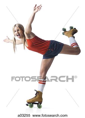 Stock Photography - Portrait of young woman roller skating. Fotosearch