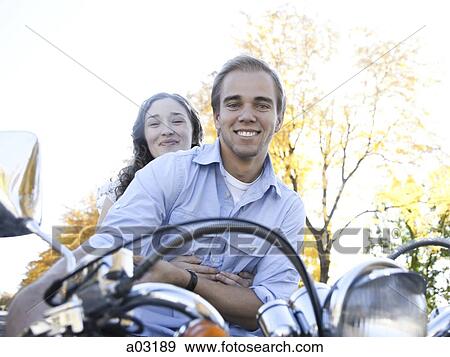 Provo, USA, Utah, Young couple on motorcycle View Large Photo Image Stock Photo - Provo, USA, Utah, Young couple on motorcycle. Fotosearch
