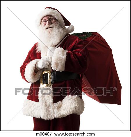 Stock Photo - santa claus carrying a bag of presents. Fotosearch