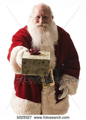 santa claus giving a present View Large Photo Image Stock Photo - santa claus giving a present. Fotosearch