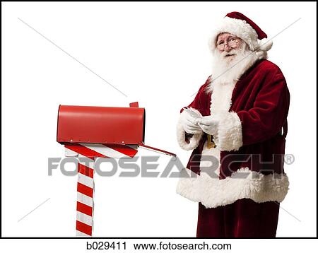 santa getting mail out of his mailbox View Large Photo Image Stock Image - santa getting mail out of his mailbox. Fotosearch