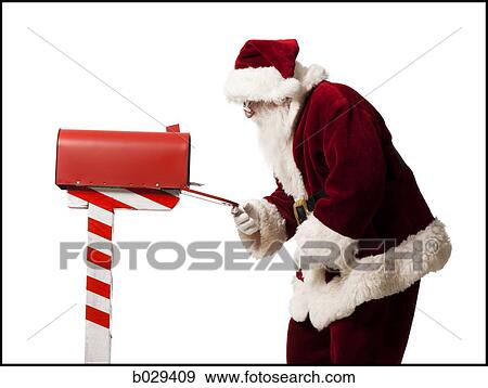 santa getting mail out of his mailbox View Large Photo Image Stock Photo - santa getting mail out of his mailbox. Fotosearch