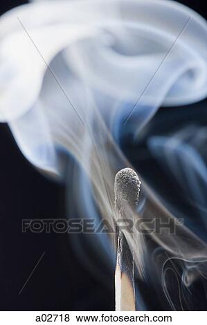 Smoking match against black background View Large Photo Image Stock Photo - Smoking match against black background. Fotosearch