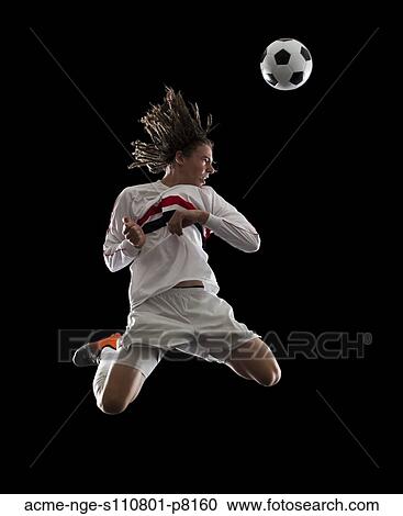 soccer player heading the ball View Large Photo Image Stock Image - soccer player heading the ball. Fotosearch