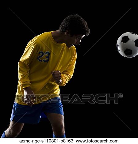 soccer player heading the ball View Large Photo Image Stock Image - soccer player heading the ball. Fotosearch