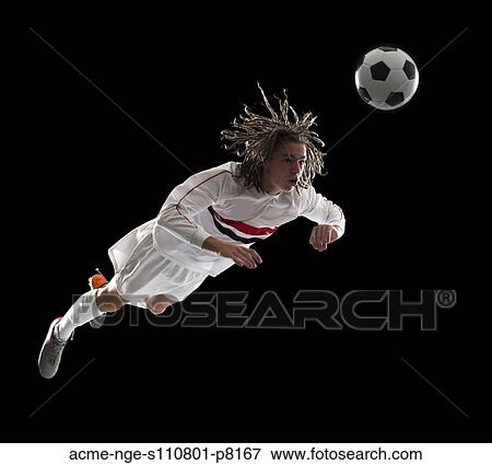 Soccer player heading the ball View Large Photo Image Stock Photo - Soccer player heading the ball. Fotosearch