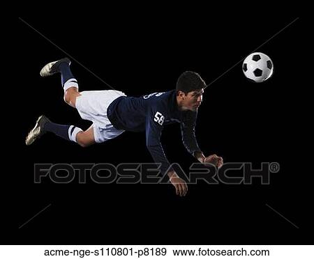 Soccer player heading the ball View Large Photo Image Stock Photo - Soccer player heading the ball. Fotosearch