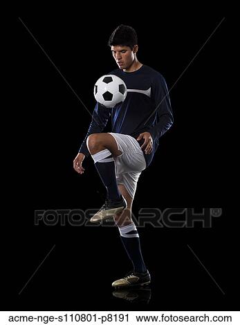 Soccer player juggling the ball. View Large Photo Image Stock Image - Soccer player juggling the ball.. Fotosearch