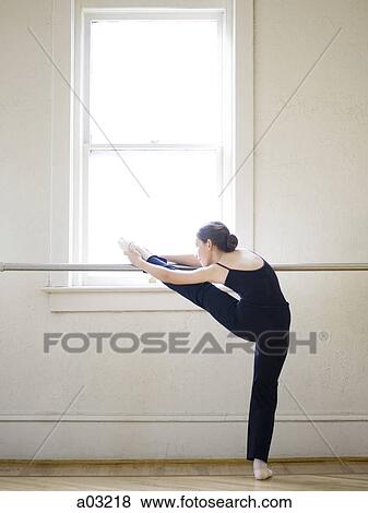 Springville, Utah, USA, Ballet dancer (12-13) stretching View Large Photo Image Stock Photo - Springville, Utah, USA, Ballet dancer (12-13) stretching. Fotosearch