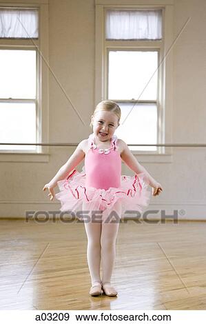 Springville, Utah, USA, Little ballet dancer (4-5) wearing pink tutu smiling, portrait View Large Photo Image Stock Photo - Springville, Utah, USA, Little ballet dancer (4-5) wearing pink tutu smiling, portrait. Fotosearch