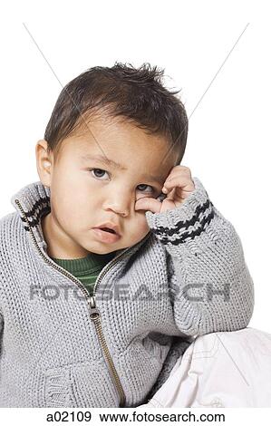 Stock Photo - Studio portrait of baby boy (18-23 months). Fotosearch