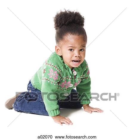 Studio portrait of baby girl (18-23 months) sulking View Large Photo Image Stock Image - Studio portrait of baby girl (18-23 months) sulking. Fotosearch