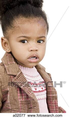 Stock Photo - Studio portrait of baby girl (18-23 months). Fotosearch