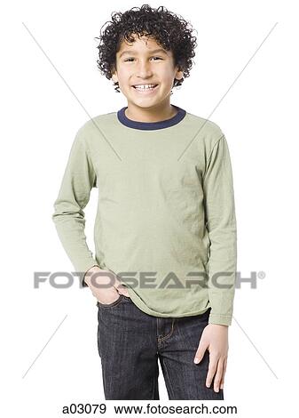 Studio portrait of boy (8-9) smiling View Large Photo Image Stock Photo - Studio portrait of boy (8-9) smiling. Fotosearch