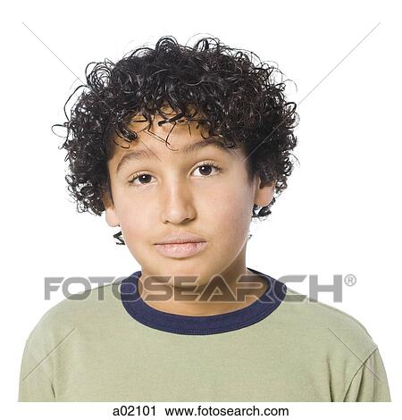 Studio portrait of boy (8-9) with curly hair View Large Photo Image Stock Image - Studio portrait of boy (8-9) with curly hair. Fotosearch