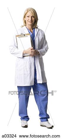 Picture - Studio portrait of female doctor holding blank clipboard. Fotosearch
