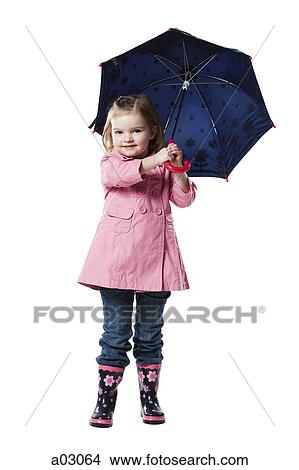 Picture - Studio portrait of girl (2-3) holding umbrella. Fotosearch