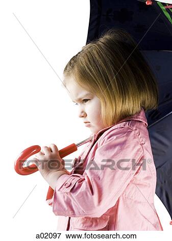 Studio portrait of girl (2-3) holding umbrella View Large Photo Image Stock Photo - Studio portrait of girl (2-3) holding umbrella. Fotosearch