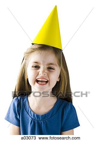 Studio portrait of girl (4-5) wearing party hat and laughing View Large Photo Image Stock Image - Studio portrait of girl (4-5) wearing party hat and laughing. Fotosearch