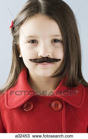 Studio portrait of girl (6-7) wearing fake moustache View Large Photo Image Stock Image - Studio portrait of girl (6-7) wearing fake moustache. Fotosearch