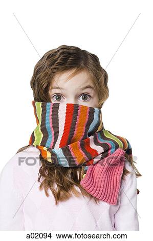 Studio portrait of girl (6-7) with scarf covering face View Large Photo Image Picture - Studio portrait of girl (6-7) with scarf covering face. Fotosearch