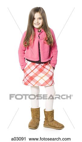 Studio portrait of girl (8-9) smiling View Large Photo Image Stock Image - Studio portrait of girl (8-9) smiling. Fotosearch