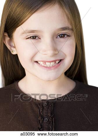 Studio portrait of girl (8-9) smiling View Large Photo Image Stock Photography - Studio portrait of girl (8-9) smiling. Fotosearch
