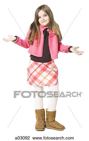 Studio portrait of girl (8-9) with arms up View Large Photo Image Stock Image - Studio portrait of girl (8-9) with arms up. Fotosearch