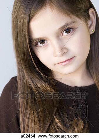 Studio portrait of girl (8-9) with brown hair View Large Photo Image Picture - Studio portrait of girl (8-9) with brown hair. Fotosearch