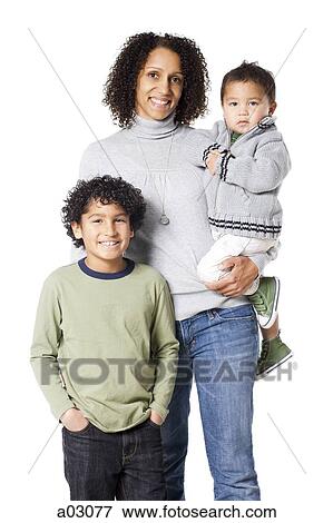 Studio portrait of mother with two sons (18-23 months, 8-9 years) View Large Photo Image Stock Photo - Studio portrait of mother with two sons (18-23 months, 8-9 years). Fotosearch