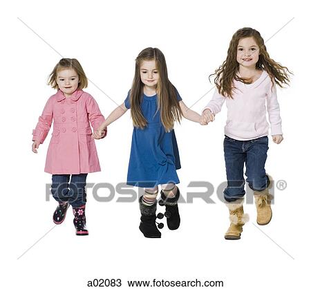 Studio portrait of three girls (2-7) holding hands View Large Photo Image Stock Image - Studio portrait of three girls (2-7) holding hands. Fotosearch