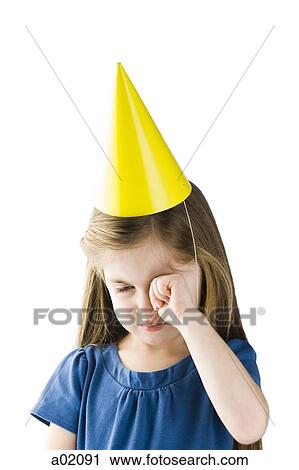 Studio portrait of upset girl (4-5) wearing party hat View Large Photo Image Stock Image - Studio portrait of upset girl (4-5) wearing party hat. Fotosearch