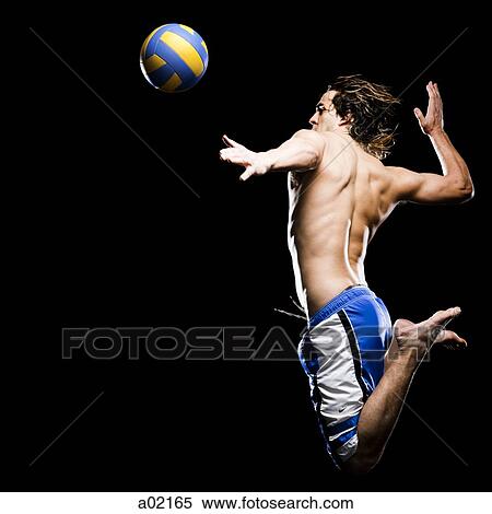 Studio shot of man jumping to hit soccer ball View Large Photo Image Stock Photography - Studio shot of man jumping to hit soccer ball. Fotosearch