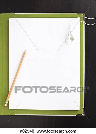Studio shot of note pad, pencil and headphones View Large Photo Image Stock Photo - Studio shot of note pad, pencil and headphones. Fotosearch